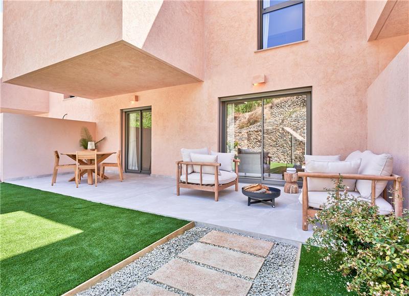 New development. Townhouse in residential complex with communal pool and gardens,